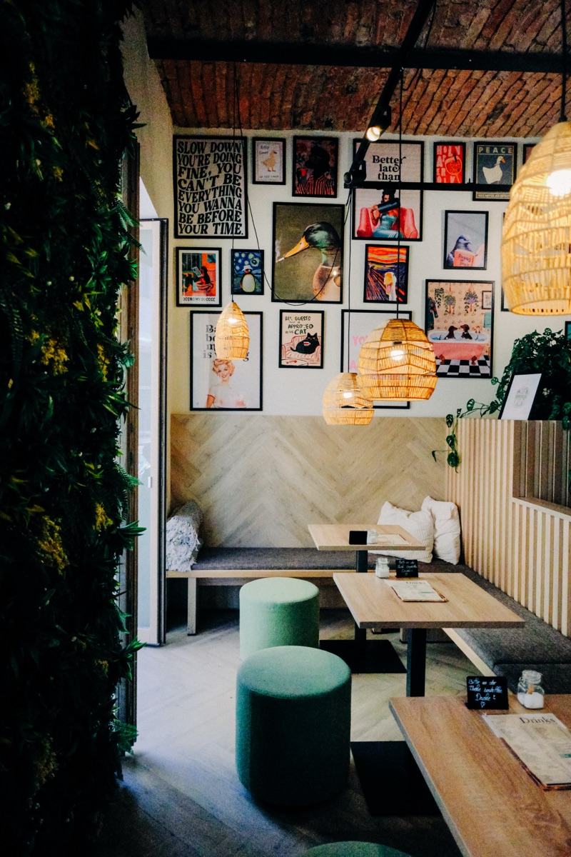 Café interior with gallery wall