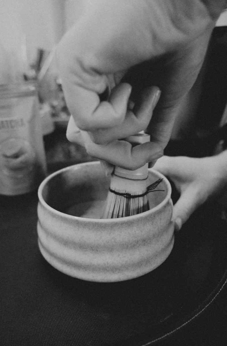 Whisking matcha