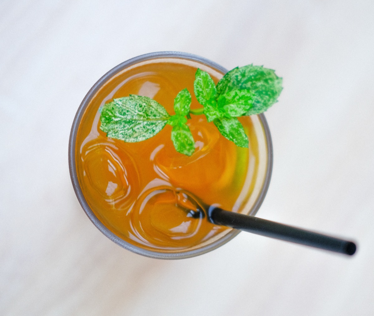 Iced drink with mint, top-down
